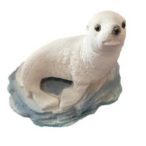 Exquisite Sand Sea Lion on Multi Blue Sea Bed Rock Glitter has Shimmering effect